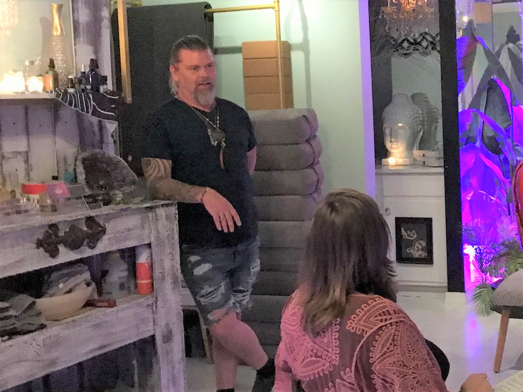 Russell shares his metaphysical story with the community in his yoga studio.